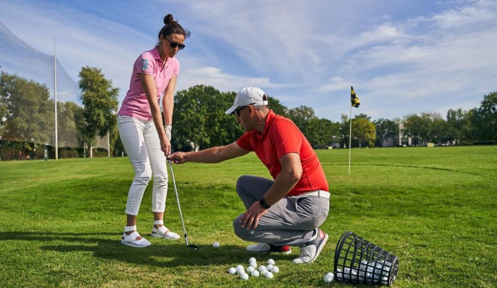 woman-holding-a-club-with-both-hands-2025-03-09-07-27-54-6JBMY23-1024x683